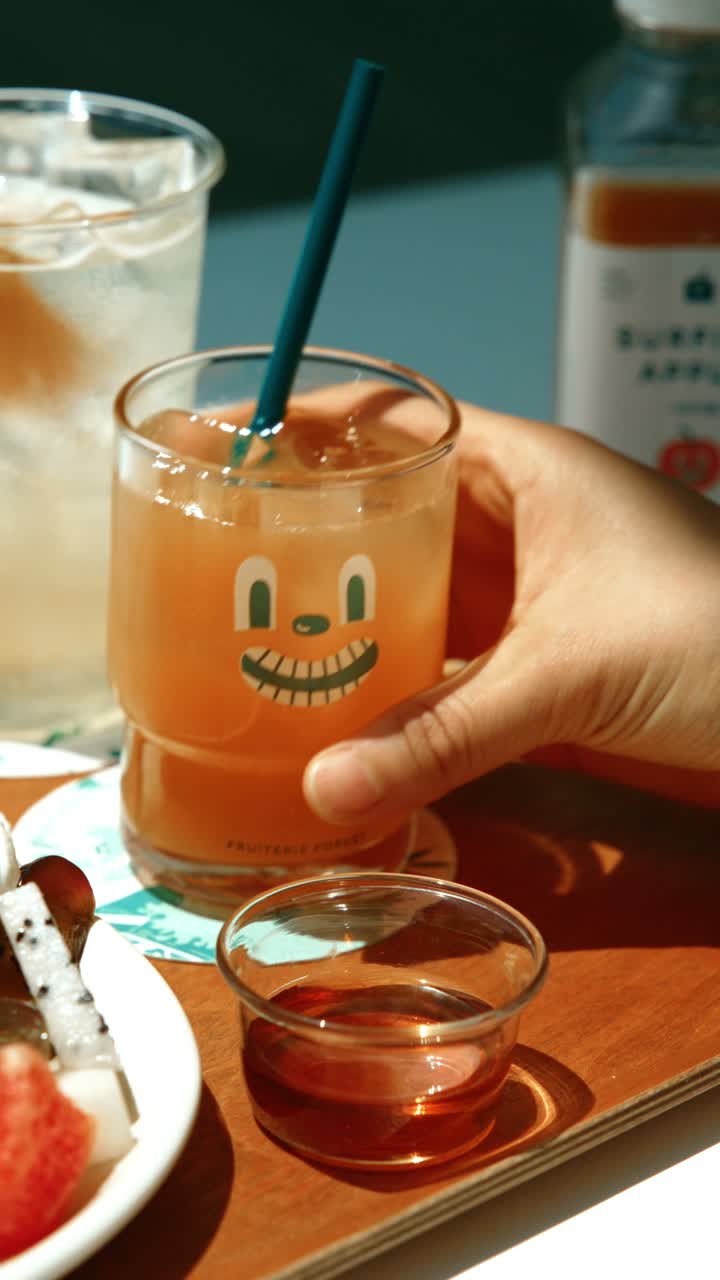 Juice glass with character artwork